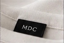 MDC label in de kraag
